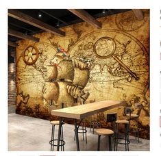 an old world map is on the wall in this room with wooden tables and stools