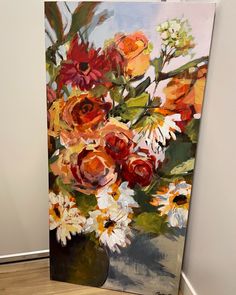 an oil painting of flowers in a vase