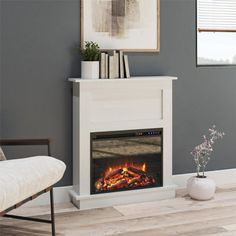 a living room with a chair and a fire place in the corner on the floor