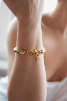 Stylish and fashionable, this impressive Snake Chain Bracelet will complement any outfit. Look perfect by sporting this Thick Omega Bracelet and dress up for a party, a night out with your girlfriends, or a romantic date. This Gold Filled Bee Cuff is a wonderful gift for your wife, mom, sister, girlfriend, or woman you love. Christmas is coming- be the trendsetter on your list this year with this Brass Chunky Bracelet! Material: ♥ 24K yellow gold filled brass omega snake chain bracelet with sail Bracelets With Spring Ring Clasp As Gift, Gift Bracelets With Spring Ring Clasp, Elegant Brass Bracelet With Gold Chain, Omega Bracelet Women, Elegant Brass Charm Bracelet With Adjustable Chain, Adjustable Bracelet With Butterfly Clasp As Gift, Adjustable Bracelets With Butterfly Clasp For Gifts, Adjustable Bracelet With Butterfly Clasp For Gifts, Gold-tone Brass Bracelet With Gold Chain