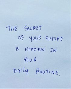 a piece of paper with writing on it that says the secret of your future is hidden in your daily routine