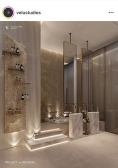 an image of a bathroom setting with lights on the wall and marble steps leading up to it