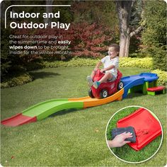 a child is playing on an outdoor play set