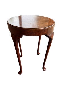 a small wooden table with two legs and a circular top on one end, against a white background