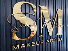 the logo or sign for samala mellow's make - up artist, which is located in an office building