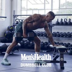 a man working out with dumbbells in a gym