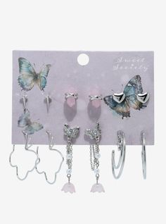 The daintiest earrings have fluttered into your jewelry collection! This pretty earring set features studs of crystals  stars and hearts  plus drop earrings of butterflies and flowers with pearlescent details. Dangling Butterfly Earrings, Jewelry For Guys, Pretty Earring, Accesorios Aesthetic, Goth Costume, Stars And Hearts, Hoop Earring Set, Hot Topic Jewelry, Hello Kitty Clothes