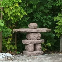 there is a statue made out of rocks