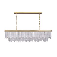 a large rectangular light fixture hanging from a gold chain with crystal beads on the bottom