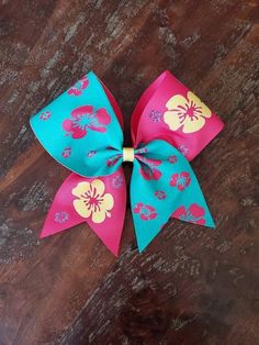 Tropical Cheer Bow/Softball Bow/ Dance Bow 3 inch wide ribbon with Glitter HTV attached. Colors can be changed. Hair Tie attached. Bows are made stiff. Disney Cheer Bows, Cute Cheer Bows, Neon Bows, Dance Bows, Softball Bow, Custom Cheer Bows, Glitter Cheer Bow, Pony O, Blue Cheer