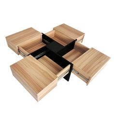 four wooden drawers with one open and the other closed