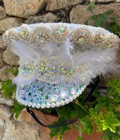 Fabulous sequin and Pearl military hat perfect for weddings,festivities and party's . Hand decorated with Ab crystals and a lace motif . Made to order in your size so please forward your head size in cm with each order. Delivery time 4- 5 weeks  Gems and motifs May vary slightly depending on stock levels . We can also add any other sequin colours to the brim to match your outfit or accessories 😀 Short Brim Party Hat For Carnival, Handmade Costume Hat With Round Crown For Party, Adjustable Festival Headpieces For Parties, Adjustable Headpieces For Festival Party, White Brimmed Costume Hats And Headpieces For Festivals, White Brimmed Festival Costume Hats And Headpieces, Mardi Gras Party Costume Hat, High Crown Hat For Mardi Gras Party, Handmade High Crown Top Hat For Party