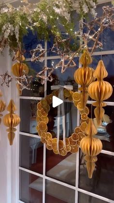 Amy Williams 💙 Waco, Tx on Instagram: "After drying oranges in the oven, I decided to use them to make a wreath that would hang in the window. During the day, the dried oranges look like stained glass. At night, it creates a feeling of a nostalgic Christmas hanging under star shaped vine garlands, folded paper ornaments and fresh cedar. 
.
#cozycottage #cottagecore #cottage #christmasdecor #christmasdecorations #nostalgic #cottagechristmas #cozyhome #driedoranges #diyhomedecor #diycrafts"