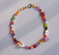 hand made freshwater pearls with glass flower beads necklace,cusotm unisex jewelry, orange and purple.Y2K,fairycore,autumn color 40+5cm adjustable. Flower Beads Necklace, Pearl Diy, Purple Y2k, Accessorize Jewellery, Y2k Fairycore, Indie Jewelry, Pearls Diy, Bead Charms Diy, Beaded Necklace Diy