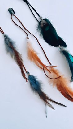 Brand new: LARGE hair feather clips! Add a little wild to your style with these feather hair clips! You can add just one or layer a couple throughout your hair for a fuller look. Super easy to clip in, doesn't tug or pull on your hair, dress up or dress down any outfit.  Made with leather string, and silver beads. silver beads may vary is size and shape.  Approx size 13-1/2 to 14-1/2" including clip  hair clips are sold individually  Items are shipped with Canada Post, tracking not included  the Hair Feathers, Wedding Barrettes, Hair Dress, Feather Hair Clips, Feather Hair, Boho Feathers, Beaded Jewelry Designs, Boho Accessories, Wild Woman