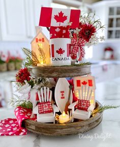 a christmas tree with candles and decorations on it