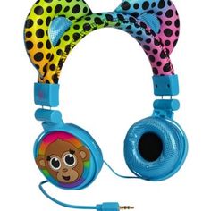 a pair of headphones with a monkey on the front and polka dots on the back