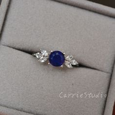 Beautiful lapis lazuli leaf design ring, nature inspired ring, understated blue color with a little gold inside, unique gift. Main Ring: Material: 925 sterling silver, plated with white gold, can also customize with solid gold. Main Stone: 6mm lapis lazuli Side Stone: CZ Band Width: Approximately 1.7mm CS0414 Main stone can be different gems, please contact for a custom request; Can also customize with solid gold; Most sizes can ship soon, if need other size, please contact me; Ship by express s Lapis Lazuli Rings Women, Lapis Lazuli Ring Silver, Lapis Lazuli Engagement Ring, Design Engagement Ring, Wedding Fairytale, Tanzanite Engagement Ring, Nature Inspired Rings, Romantic Jewelry, Lapis Lazuli Jewelry