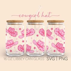 three mason jars with pink hats and stars on them