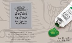 a bottle of winsor newton designer's gouache, with green liquid