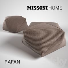 two pillows sitting next to each other on top of a white surface with the words, missoni home