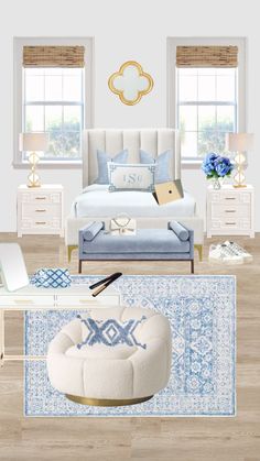 a bedroom with white furniture and blue accents