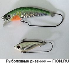 two different types of fishing lures on a white surface