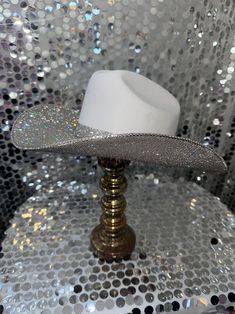 The original "Rhinestone Cowgirl" Fitted Tall Crown Hat For Party, Rhinestone Party Hat For Kentucky Derby, Rhinestone Fitted Hat For Kentucky Derby, Party Hats With Rhinestones And Short Brim, Fitted Rhinestone Hat For Kentucky Derby, Silver Hat With Rhinestones For Rodeo, Silver Rhinestone Hat For Rodeo, Western Silver Hats For Parties, Western Silver Hat With Rhinestones