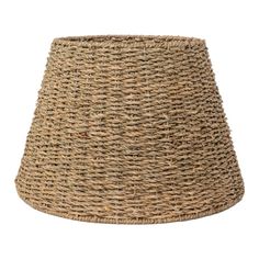 a lamp shade that is made out of wicker and has a light brown color