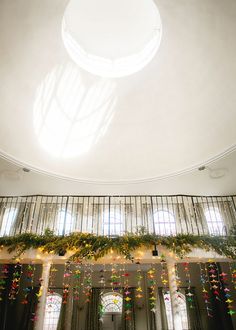 the inside of a building decorated with christmas decorations