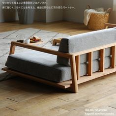 a couch sitting on top of a hard wood floor