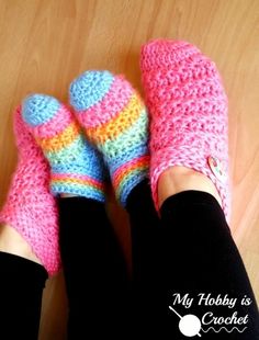 the feet of a person wearing crocheted slippers