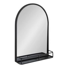 an oval mirror with shelf underneath it on a white background and the reflection is in the mirror