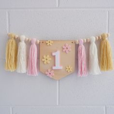 A perfect little high chair garland for those Berry first birthday photoshoots and cake smash's. DETAILS pine wood flag pink & white acrylic number 1 feature pink & yellow acrylic daisies handmade wool tassles flag is 13cm x 10cm fits to a standard size high chair garland (easy to fit with some household removable hooks - comes with) SHIPPING  We currently ship within Australia and Internationally to USA, NZ and CANADA. Australia Post has been experiencing delays during this difficult time and p Daisy Boho Birthday, High Chair Garland, First Birthday High Chair, Daisy Crown, Groovy Daisy, Boho Crown, Birthday High Chair, Felt Crown, 1st Birthday Party Decorations