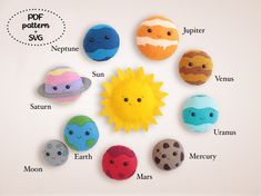 an assortment of felt planets with names on them