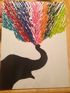 an elephant painted with colored crayons on a piece of white paper that looks like it is holding a tree