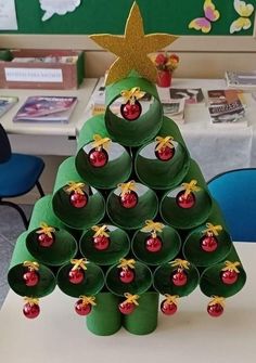 a christmas tree made out of green cups