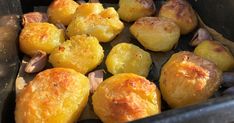 cooked potatoes and onions in a pan on the stove