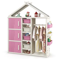 a toy doll house with pink and white furniture