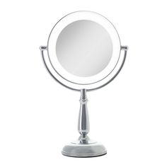 a round mirror sitting on top of a metal stand in front of a white background