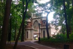 an old building in the middle of some trees