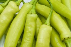 some green beans are sitting together on a table