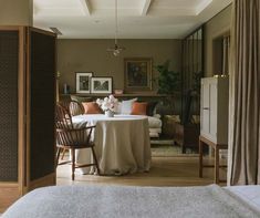 a living room filled with furniture and decor