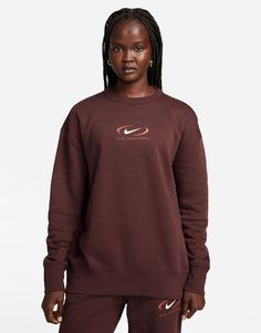 Sweatshirt by Nike Can't go wrong in sweats Crew neck Long sleeves Nike print details Oversized fit Nike Sportswear Phoenix Fleece, Earth Style, Club Fits, Cozy Vibes, Nike Swoosh, Nike Store, Crew Shirt, Women Hoodies Sweatshirts, Fleece Sweatshirt