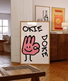 there is a sign that says one doke on the wall next to a wooden table