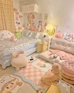 a child's bedroom with lots of stuffed animals on the floor and rugs