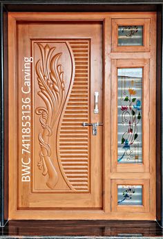 a wooden door with decorative glass panels on the front and side doors that are engraved