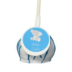 a blue and white baby toothbrush holder with an elephant on it