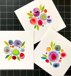 three watercolor paintings on white paper with green leaves and red, pink, purple, orange flowers