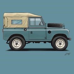 a blue land rover with a tan roof